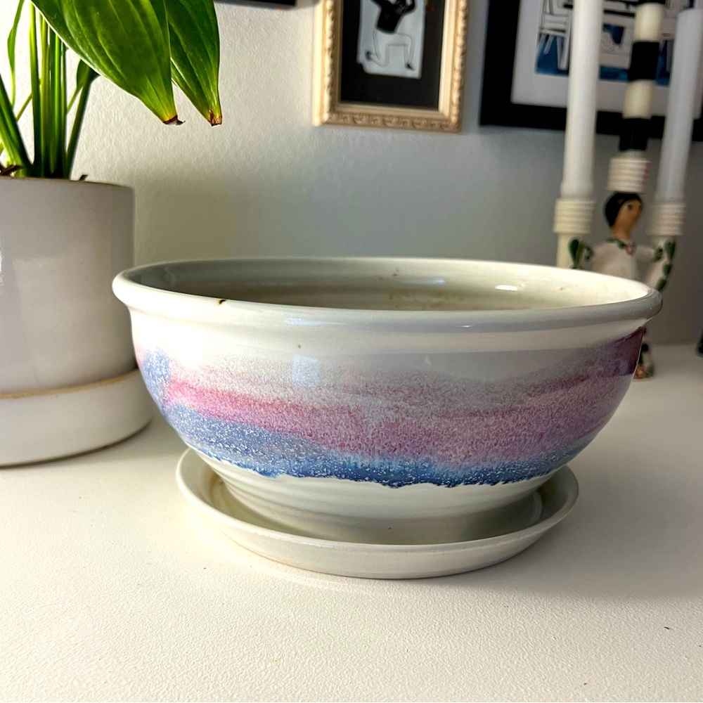 White, pink and purple pottery planter with built in saucer